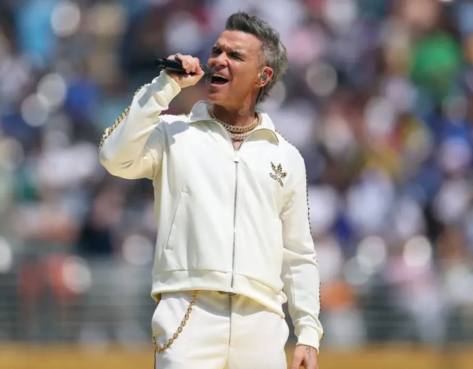 Robbie Williams Performs at FIFA Club World Cup Wearing Iced London Jewellery