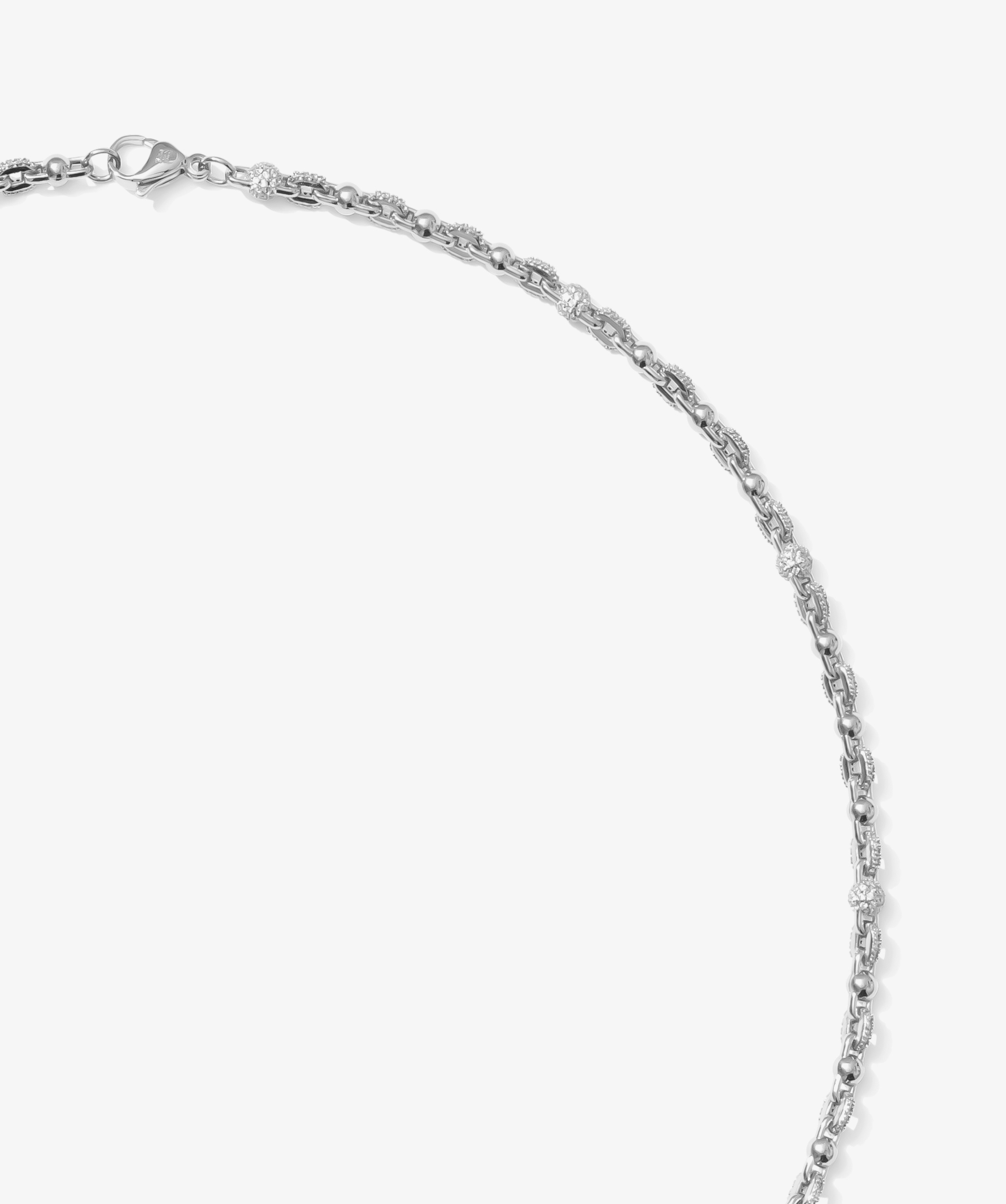ICED London silver necklace with alternating bead and pavé diamond segments, on a white background.
