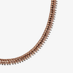 ICED London rose gold spike chain necklace, close-up on a white background.