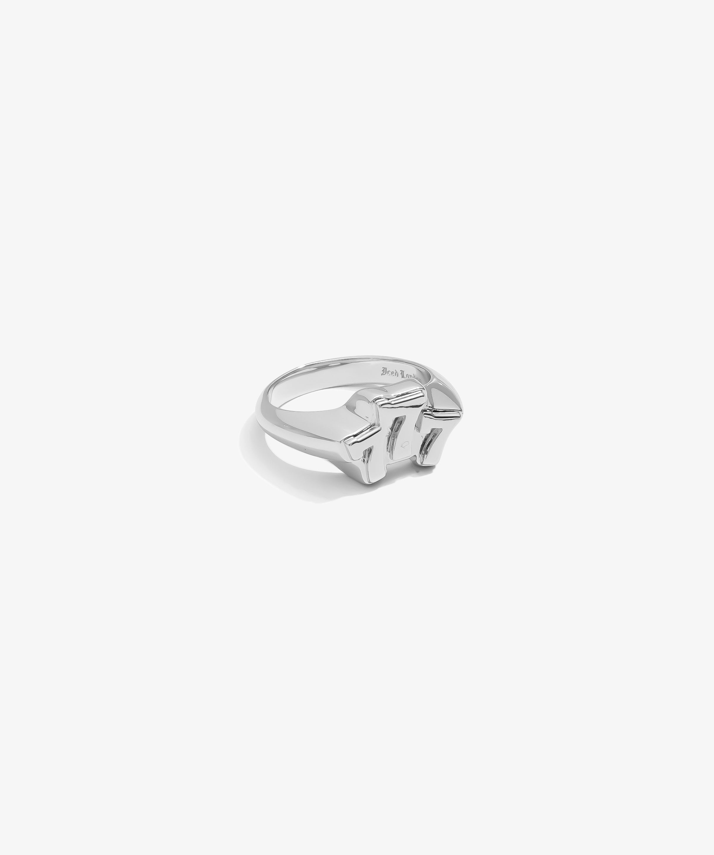 ICED London silver ring with a bold geometric block centerpiece and smooth band.
