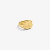 ICED London gold ring with a four-leaf clover motif on a smooth, polished band.