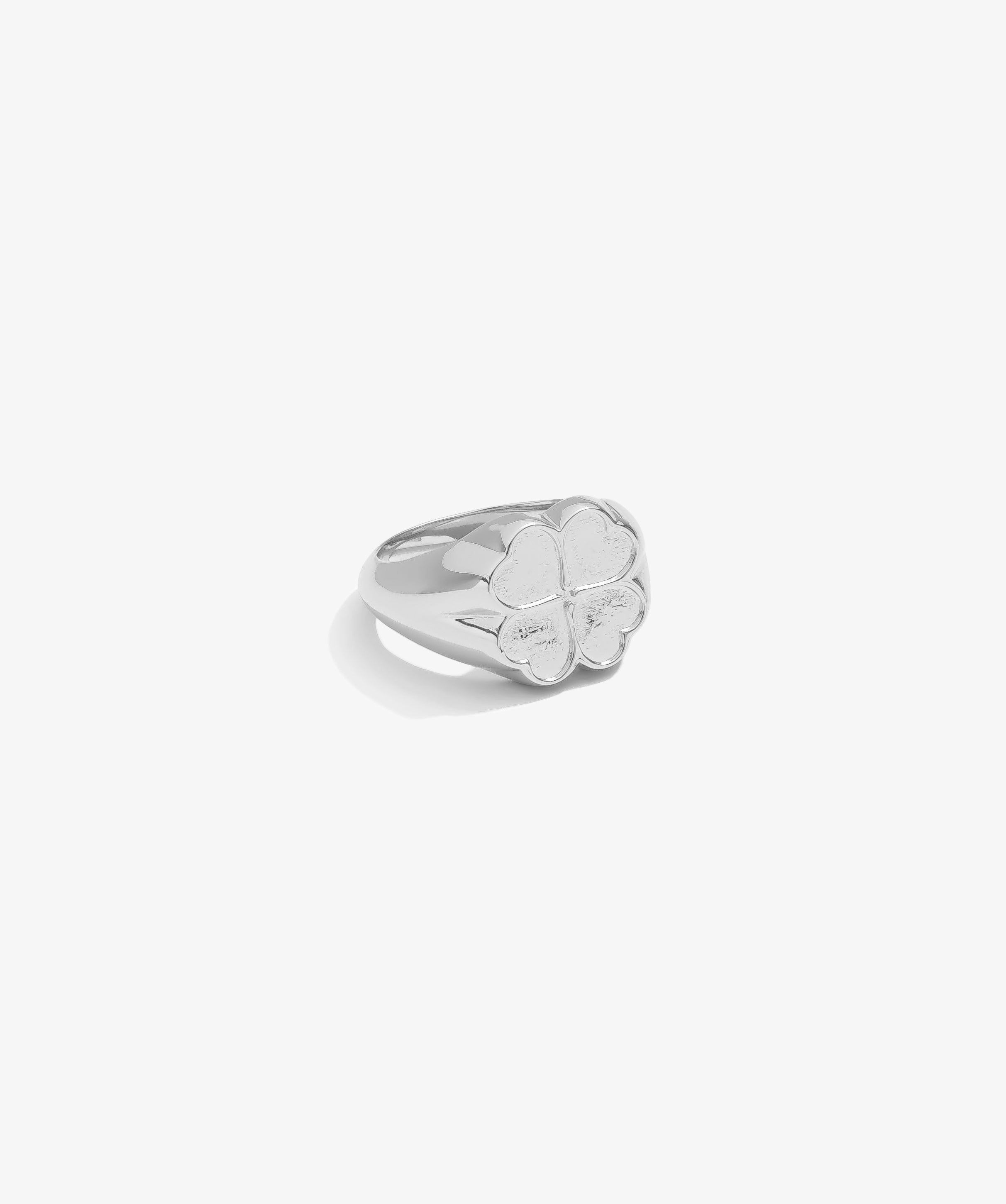 ICED London silver ring with a polished four-leaf clover design, minimalist jewelry style.