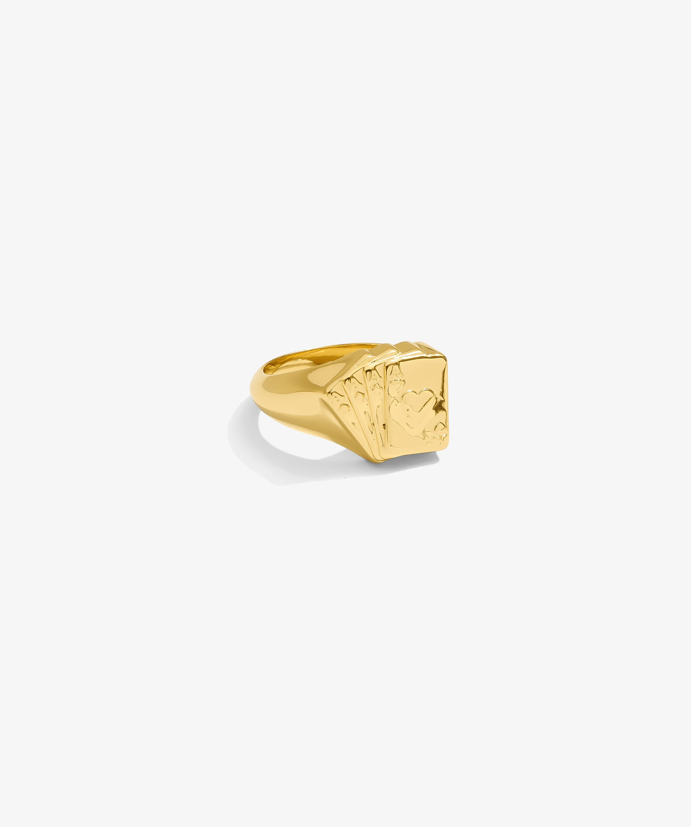 ICED London gold signet ring with a square engraved face and decorative ridges on the shank.