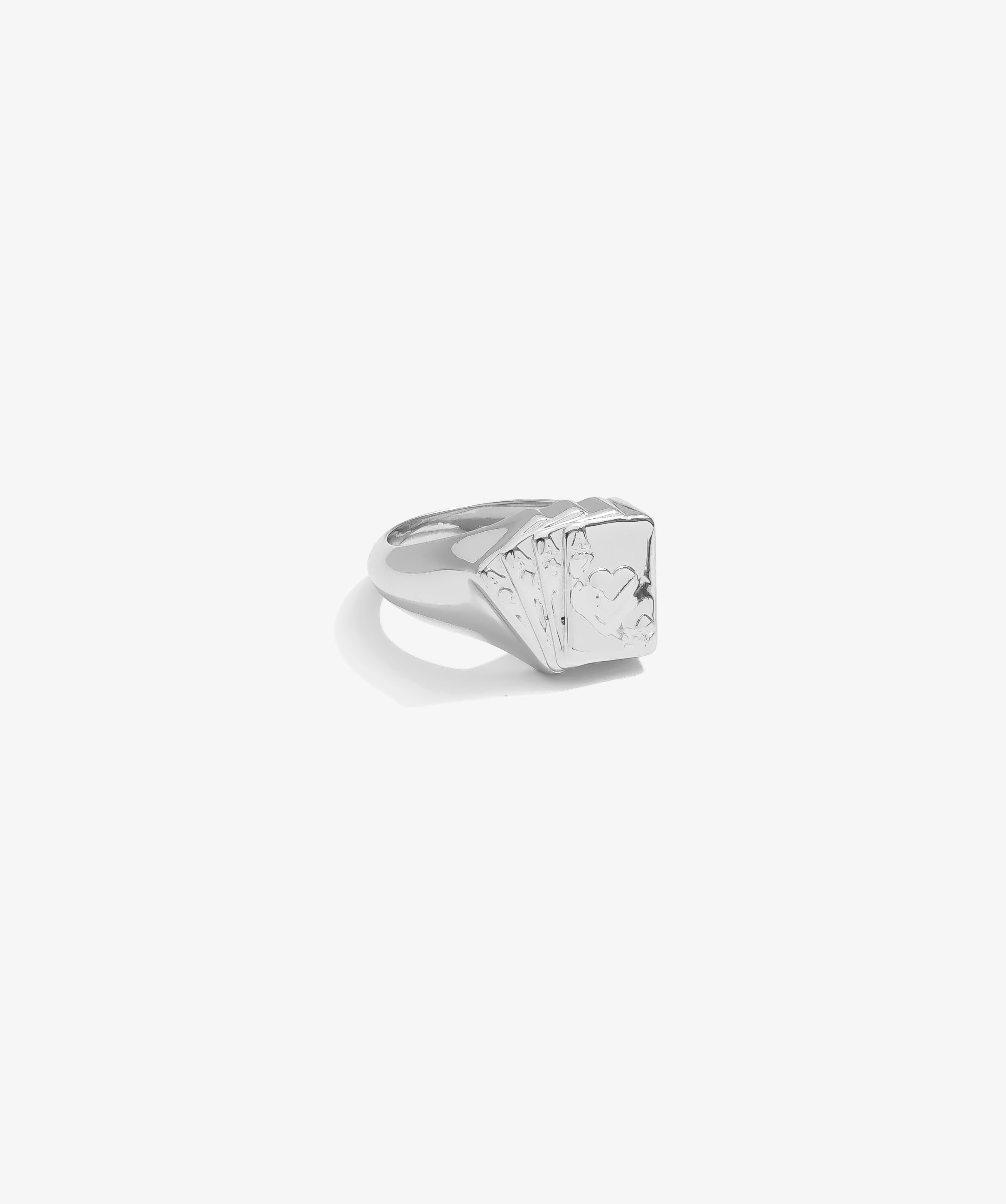 ICED London silver signet ring with engraved heart motif on a square face; side view.