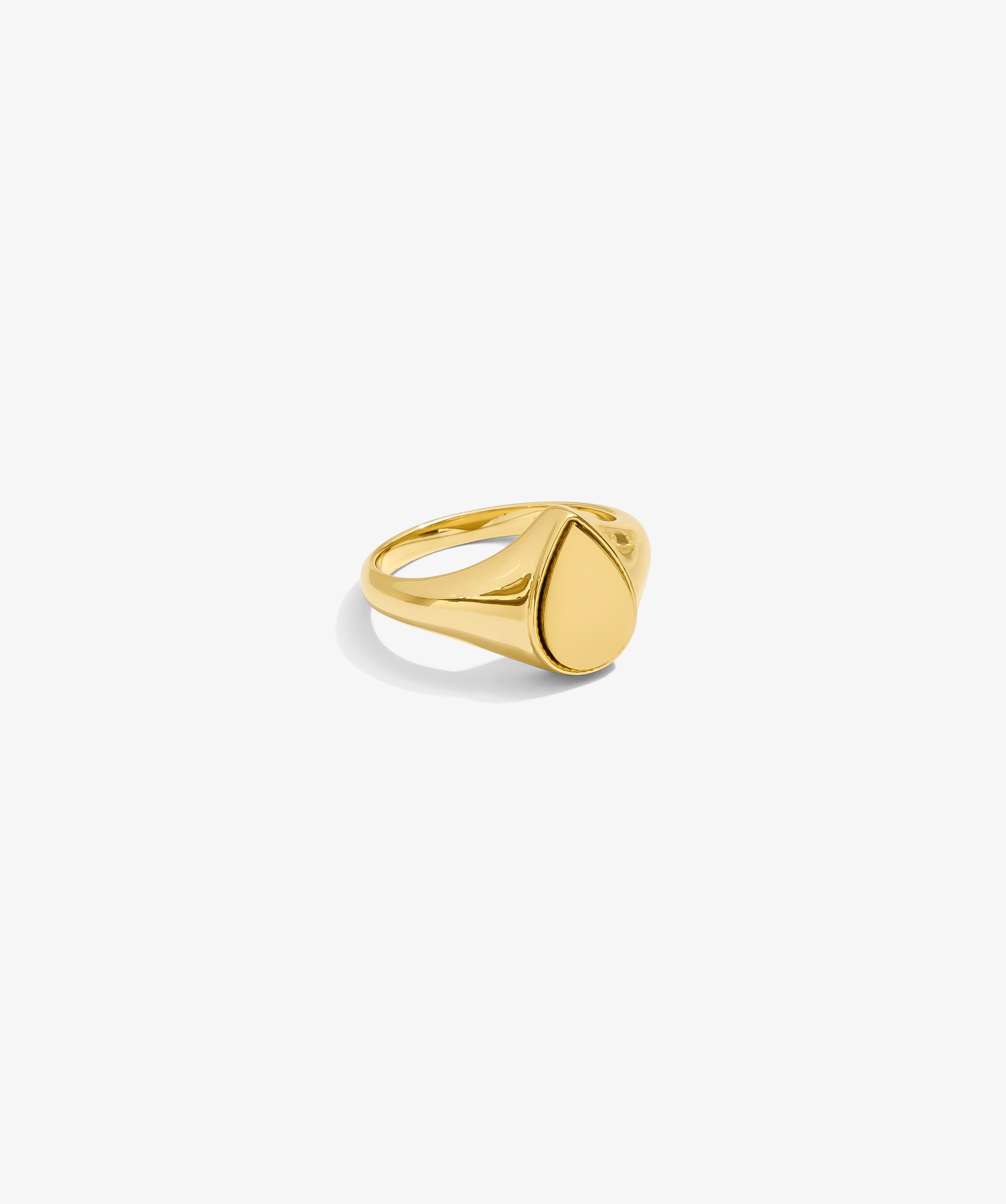 ICED London gold signet ring with a smooth square face and polished finish on a white background.