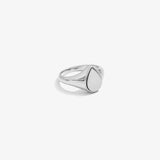 ICED London silver signet ring with a smooth oval bezel and sleek band.