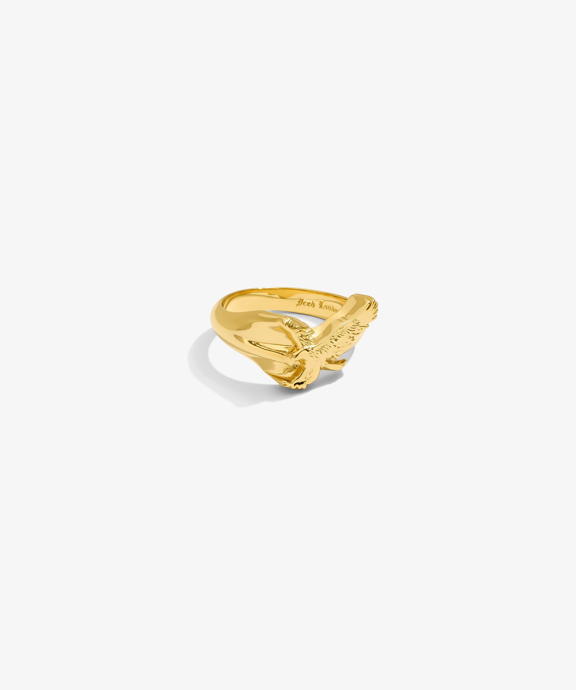 ICED London gold ring with a detailed eagle motif, open wrap design and polished finish.