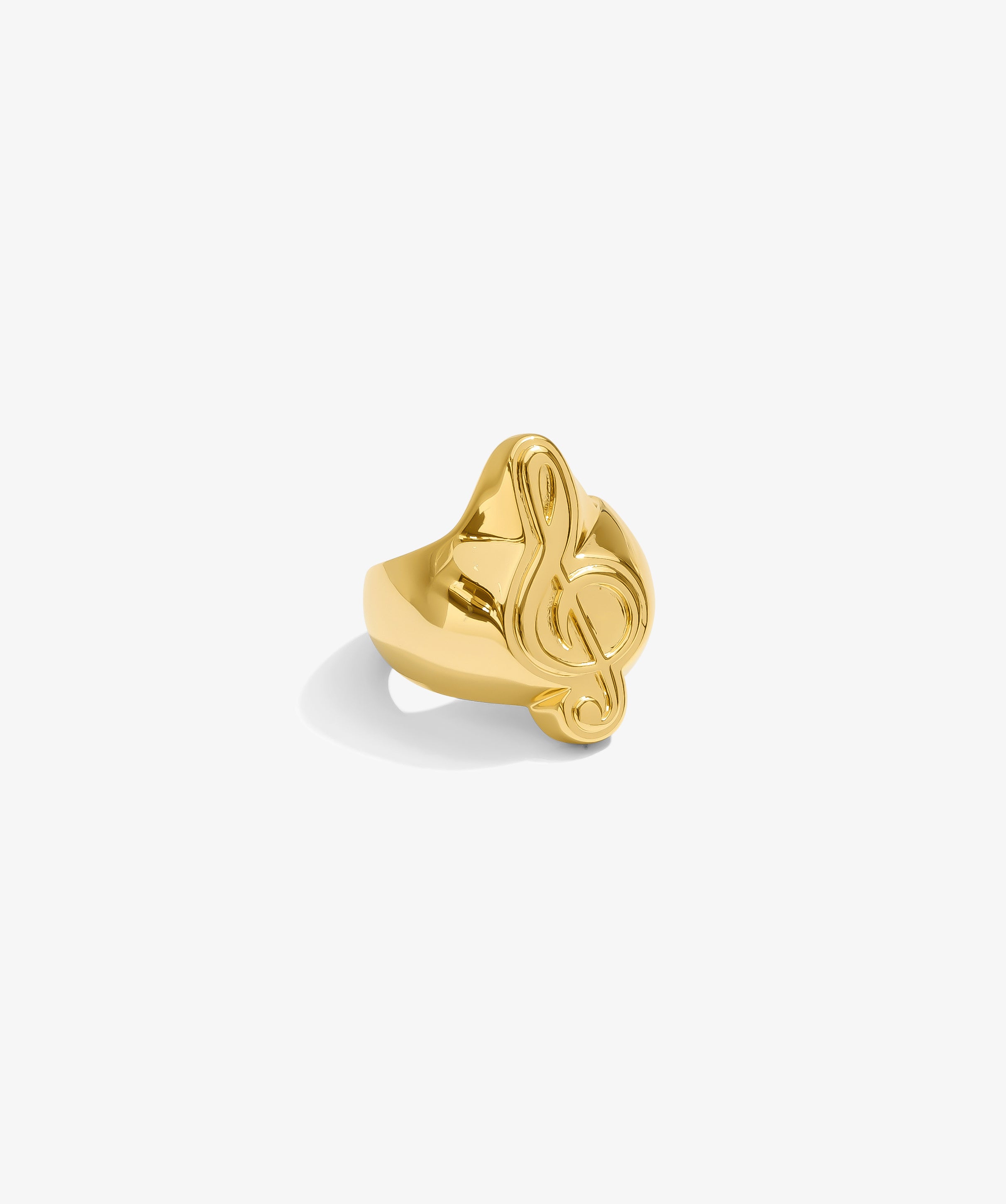 ICED London gold ring sculpted as a stylized treble clef musical note.