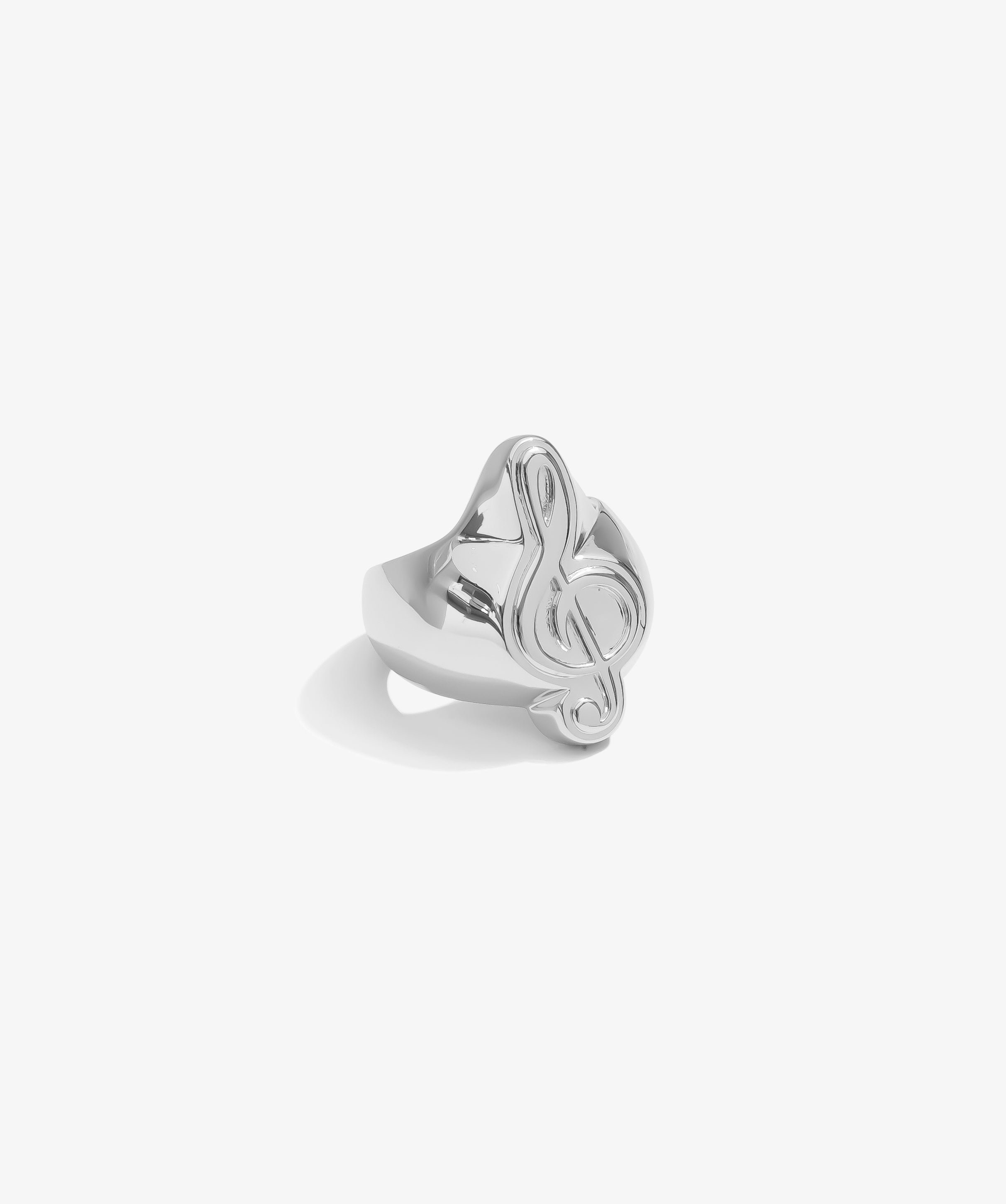 ICED London silver ring with a polished treble clef design, shown in side view.