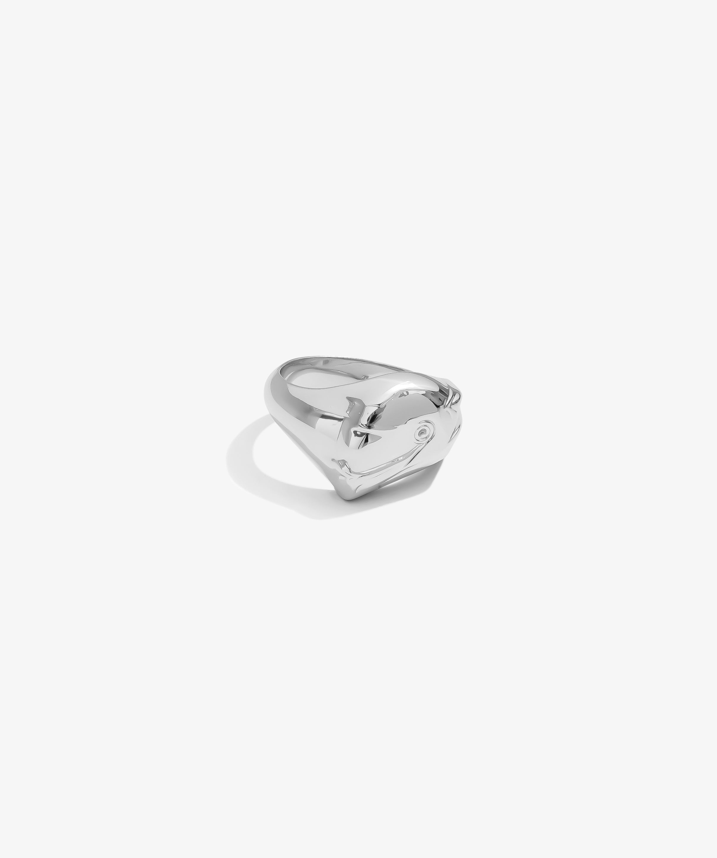 ICED London silver heart-shaped ring with a smooth, polished finish on a white backdrop.