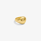 ICED London gold ring with a glossy curved band and abstract interwoven design.