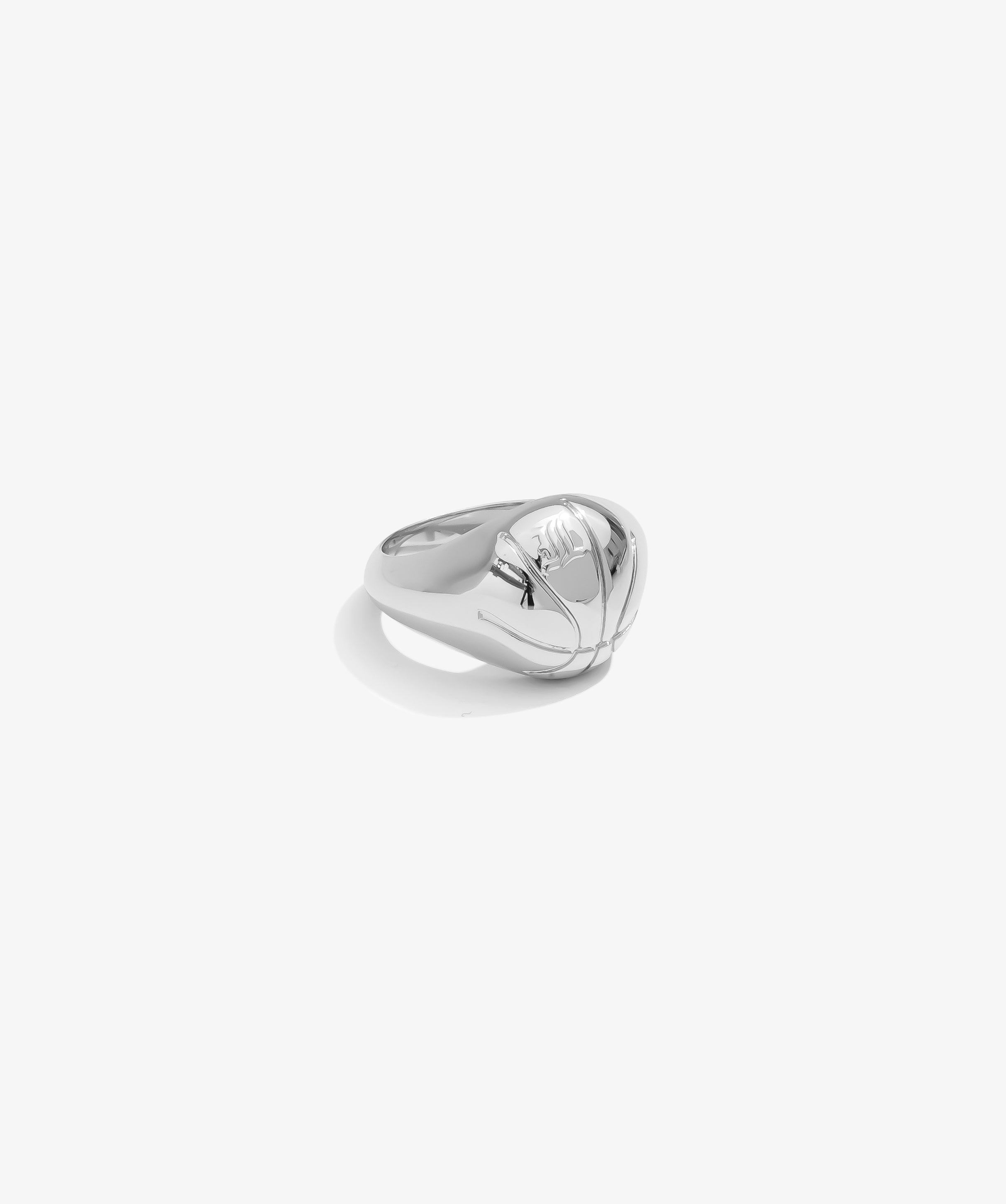 ICED London silver ring with abstract sculptural design, reflective metal on white background.