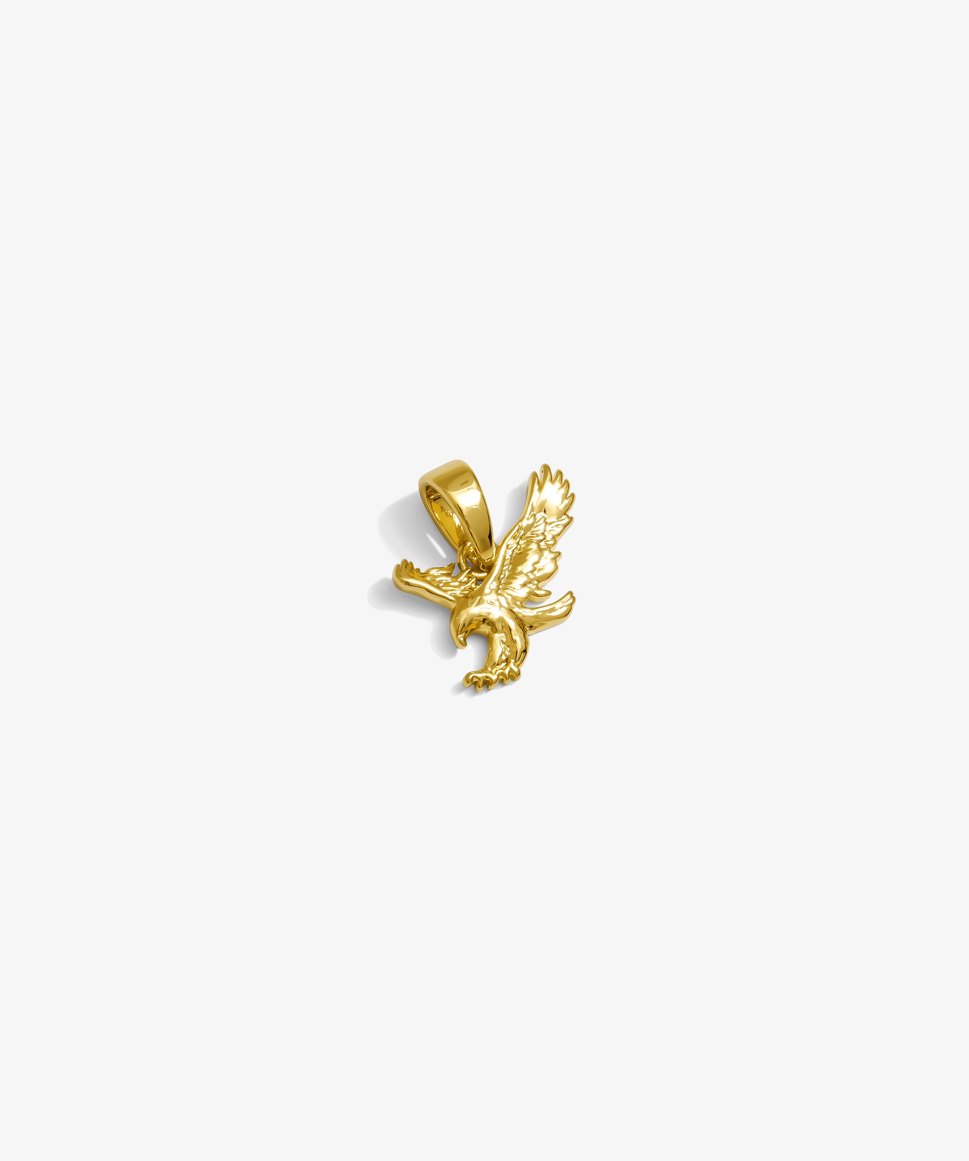 ICED London gold eagle pendant with a detailed flying eagle charm, wings spread, on a white background.
