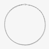 ICED London silver necklace with small stones in a delicate chain, minimalist jewelry on a white backdrop.