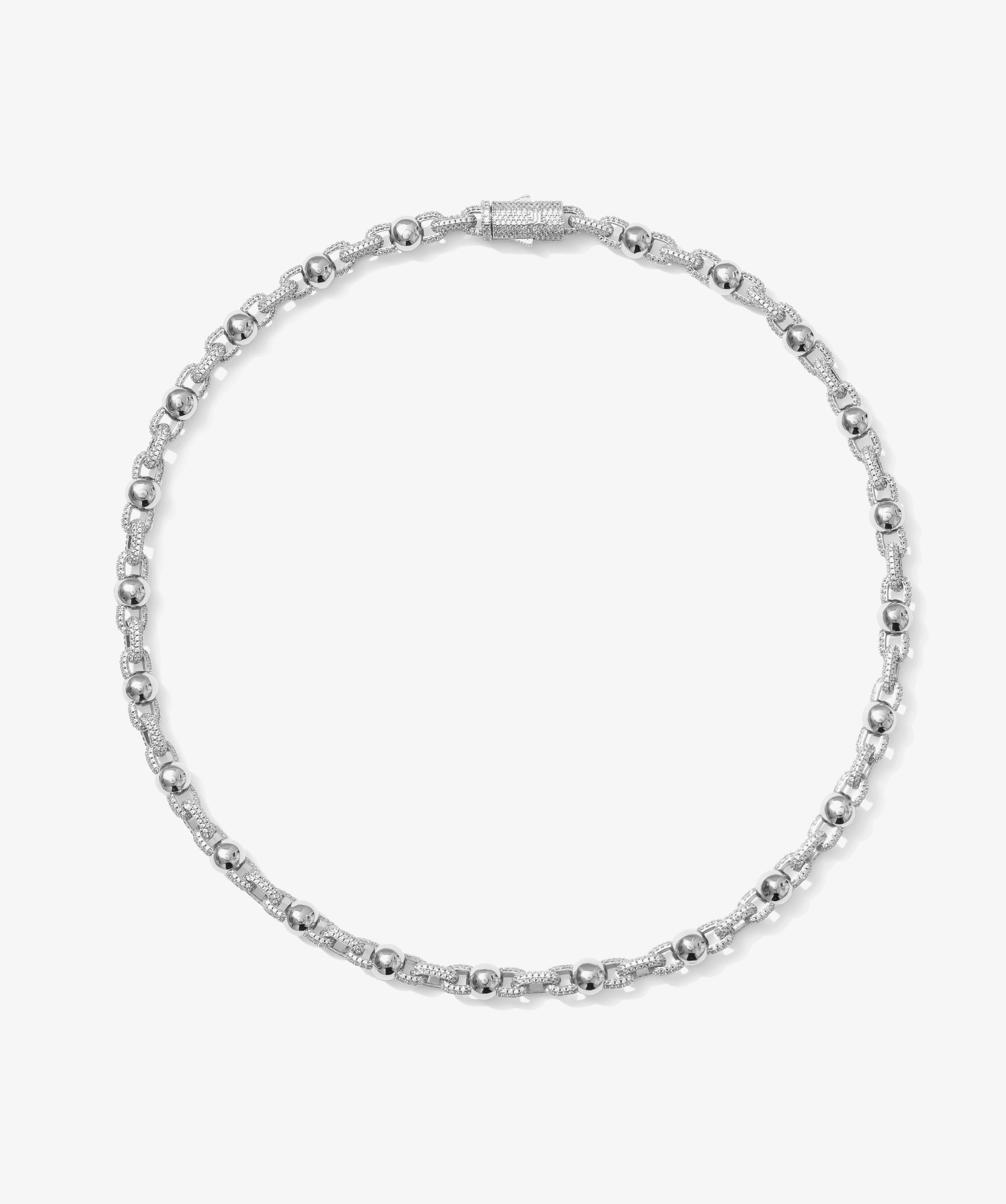ICED London silver bracelet with alternating beads and pavé links, diamond accents, elegant clasped chain jewelry.
